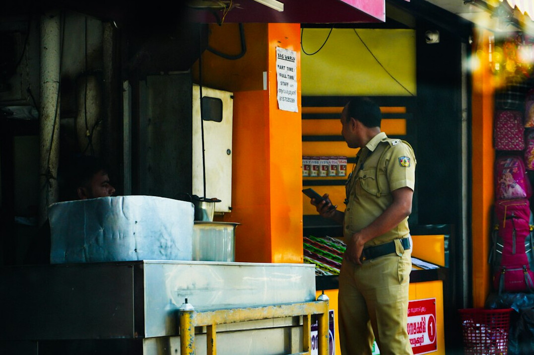 store detective watching customers